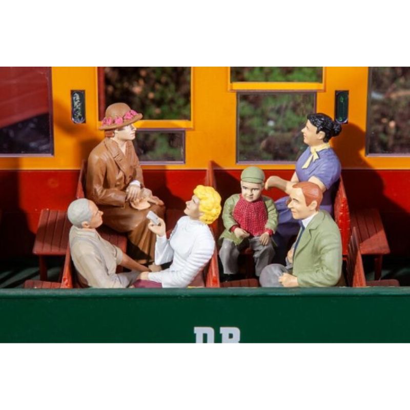G Scale Travellers Sitting in a Carriage